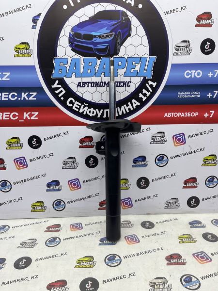 Амортизатор E38 передний левый
